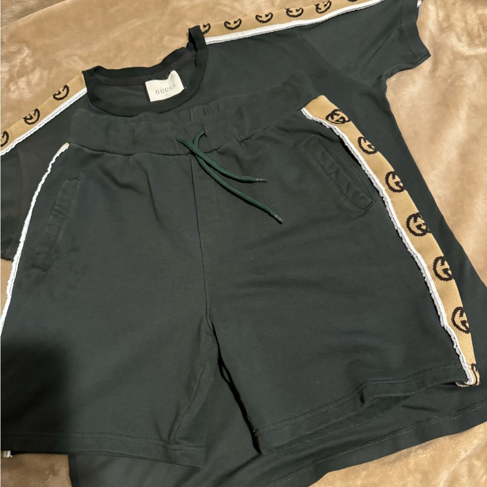This is a Gucci 2 pice set with shirt and shorts for sale!